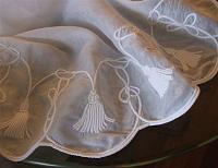 Nappe ronde en coton organza motif passementerie